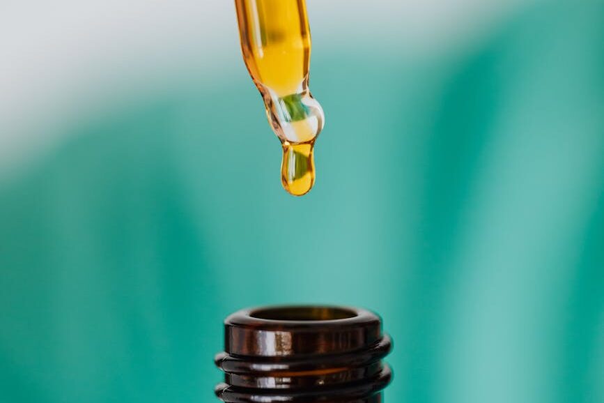 liquid medication with pipette in closeup